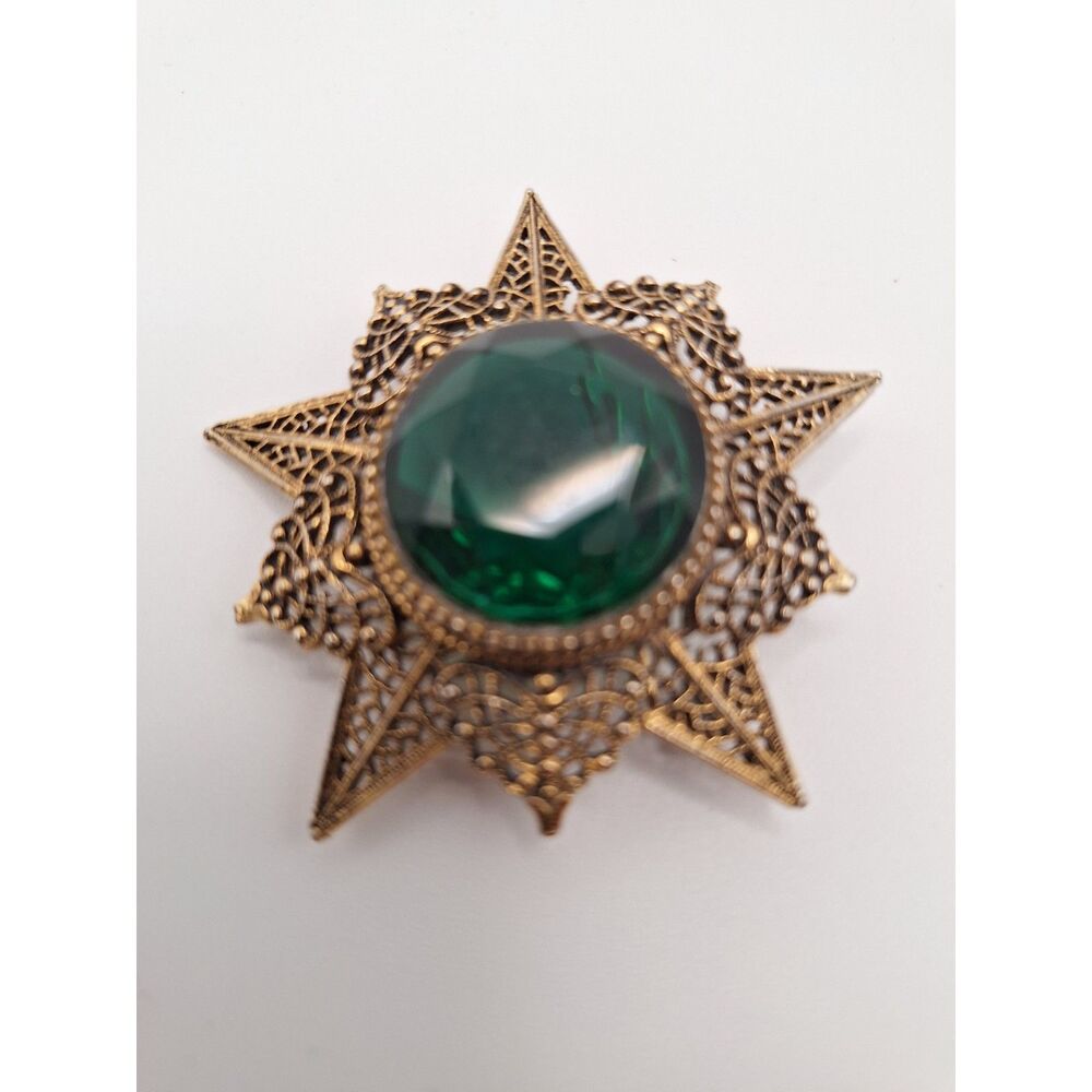 Vintage brooch Arthur Pepper faceted green glass eight point filigree star